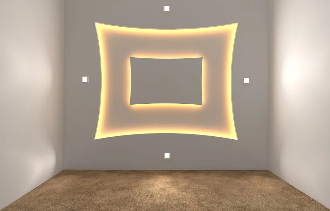 Geometric recessed ceiling with warm concealed lighting and spotlights