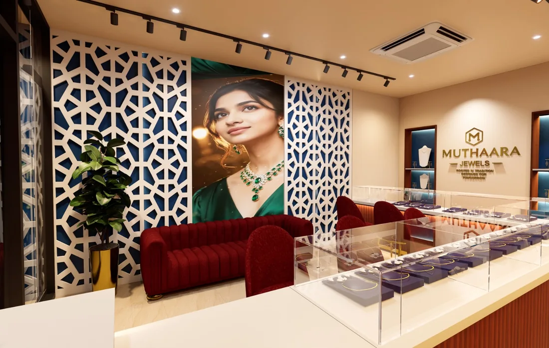 Jewellery showroom reception with red seating, pendant lighting and decorative wall panels